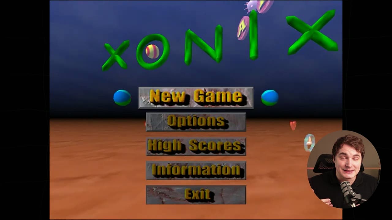 The original Xonix game title screen with green lettering and bouncing balls